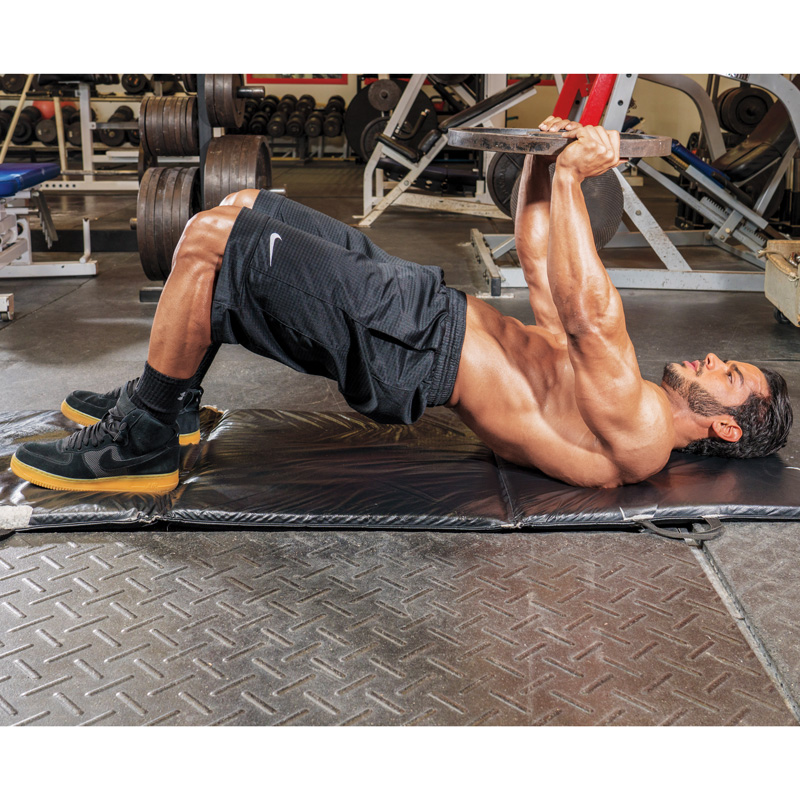 How to Do a Supine Glute Bridge and Plate Extension Muscle & Fitness