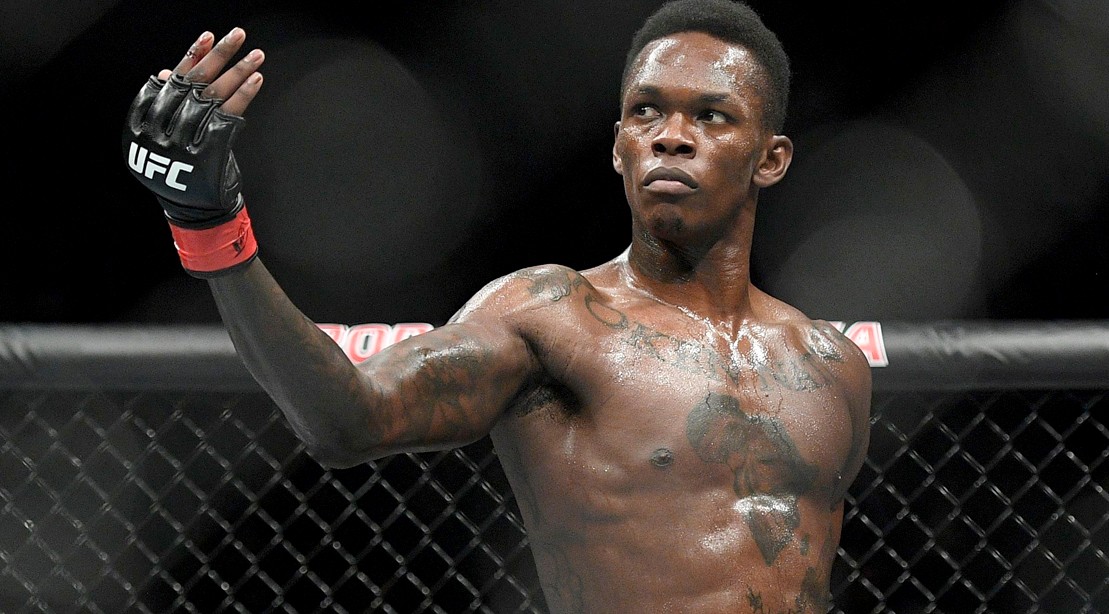 https://cdn-ami-drupal.heartyhosting.com/sites/muscleandfitness.com/files/styles/desktop_responsivecustom_user_desktop_1x/public/media/Israel-Adesanya-UFC-FIght-234.jpg?itok=NAF3VaRG×tamp=1574092000