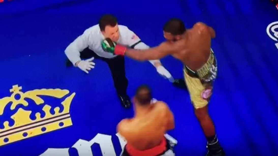 Boxer Almost Knocks Out Referee, Then Catches Him Muscle & Fitness