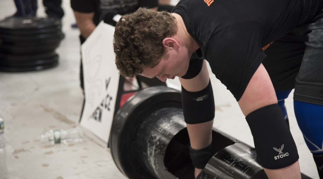 Andrew Gutman competing at a Strongman competition 