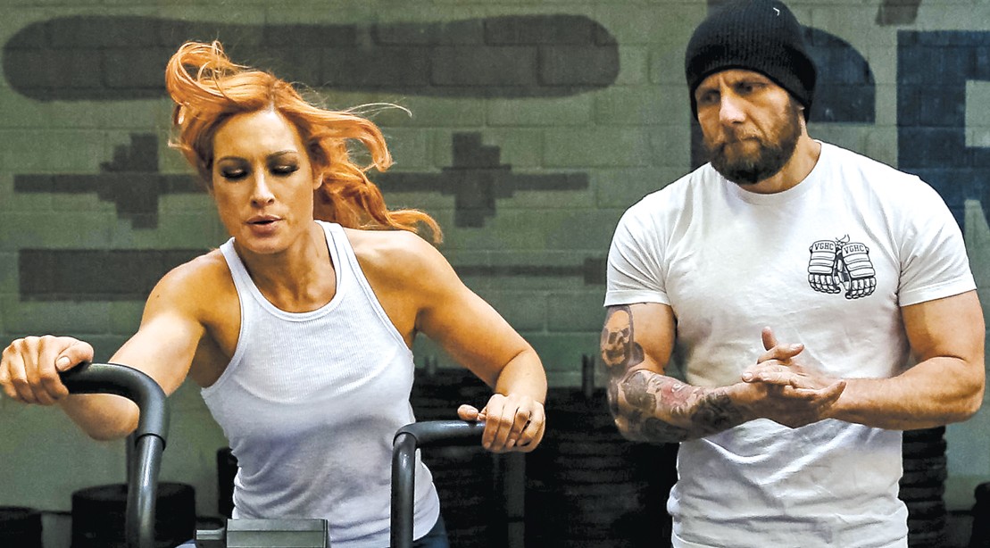 Josh-Gallegos-Training-Becky-Lynch-On-Bike Josh-Gallegos-Training-Becky-Lynch-On-Bike