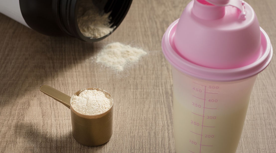 A photo of protein powder in a shaker. A photo of protein powder in a shaker.