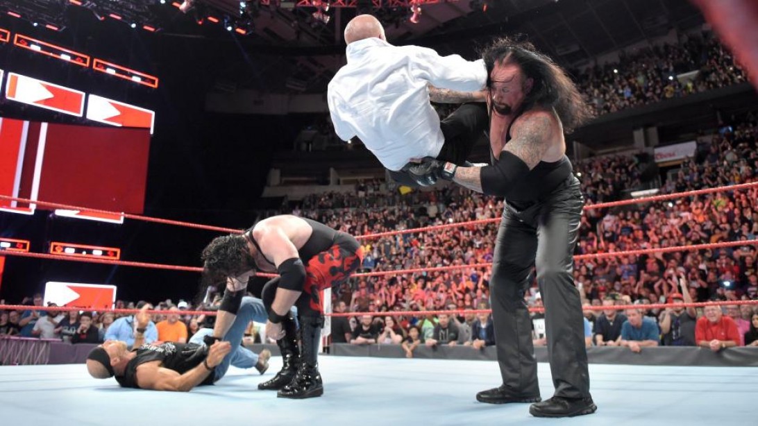 Undertaker chokeslams Triple H Undertaker chokeslams Triple H