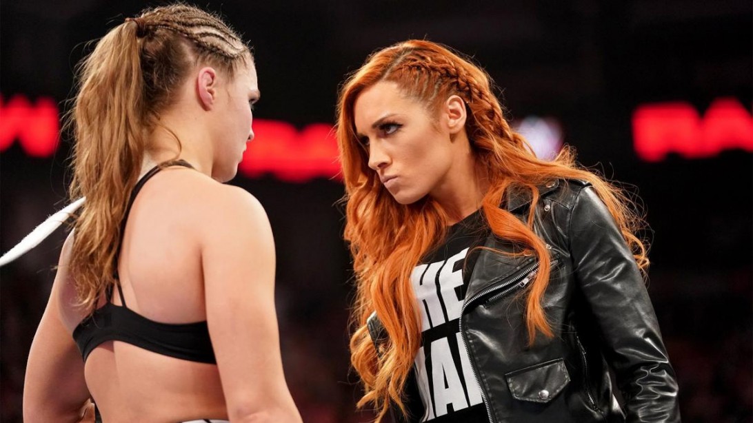 Becky Lynch staring down Ronda Rousey. Becky Lynch staring down Ronda Rousey.