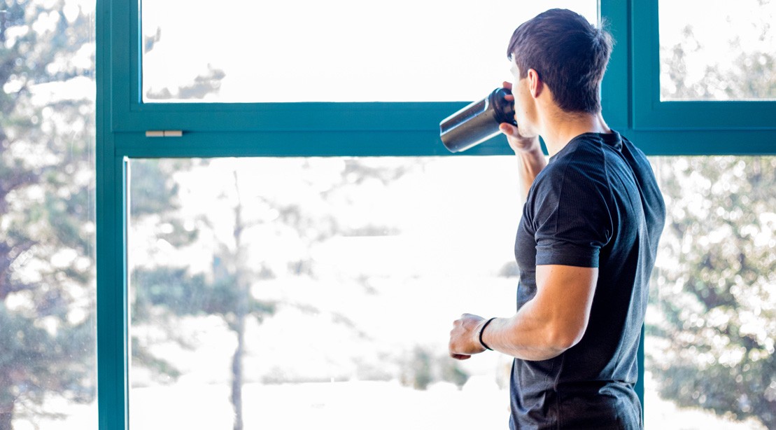 Man Drinking Workout Supplement Man Drinking Workout Supplement