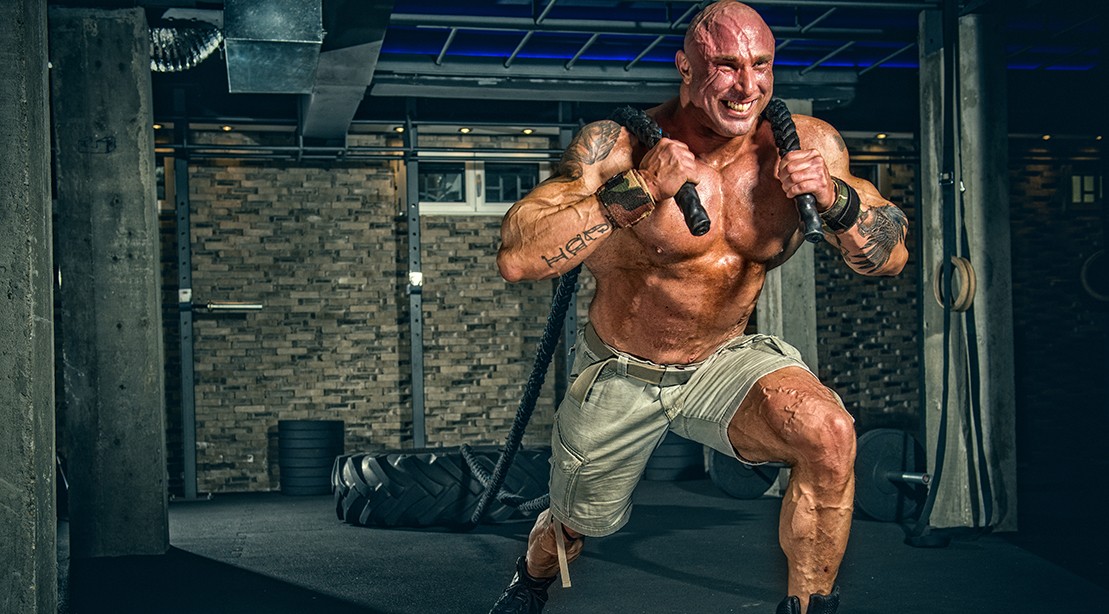 Strength Training Lift Like a Strongman in a Commercial Gym Muscle