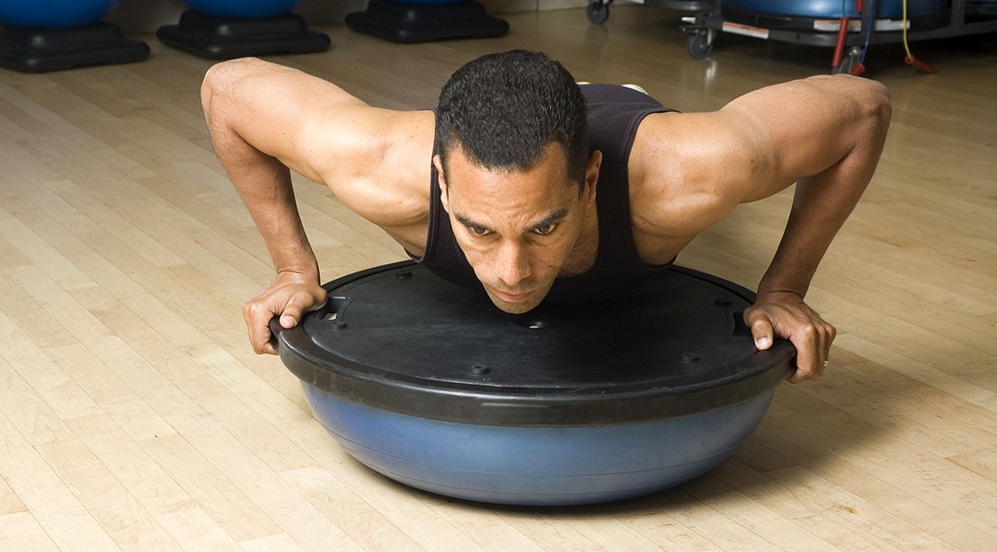 man workout bosu ball 1109