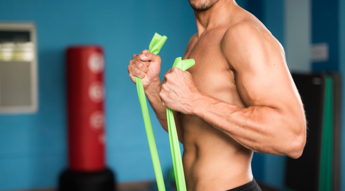 resistance band curl man GettyImages 670884157