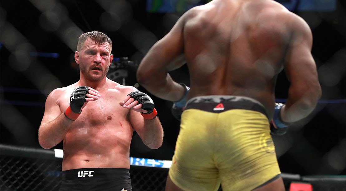 Stipe Miocic fights Francis Ngannou in their Heavyweight Championship fight during UFC 220 at TD Garden on January 20, 2018 in Boston, Massachusetts. 