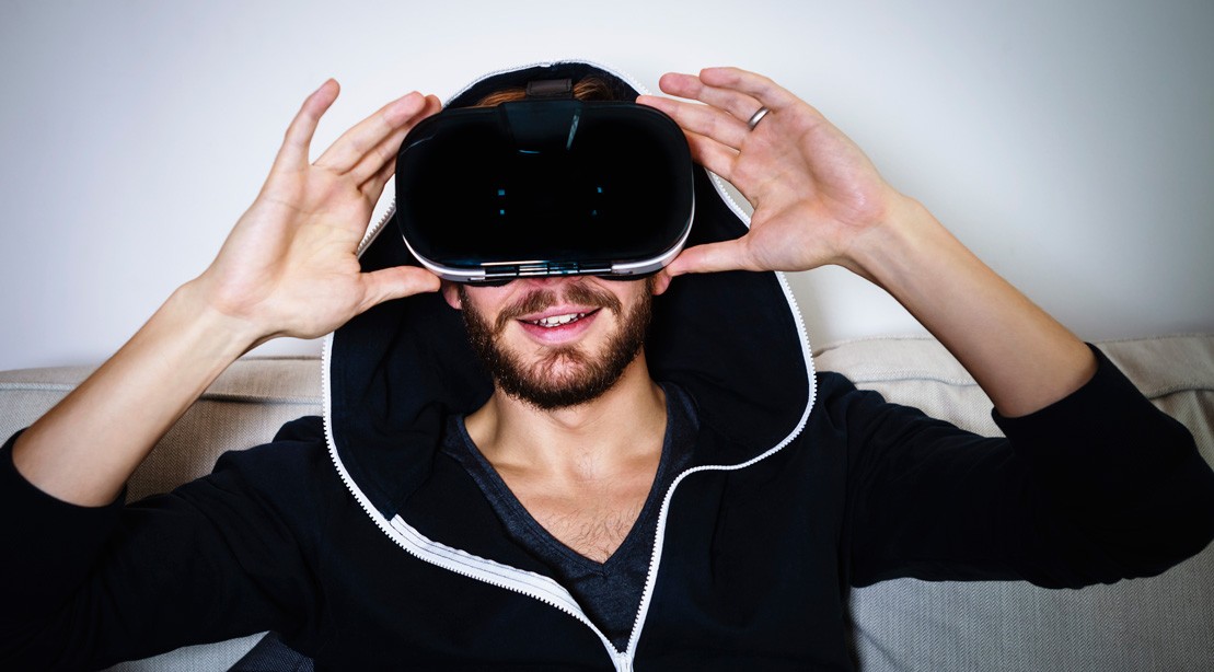 Man Using Virtual Reality Headset Man Using Virtual Reality Headset