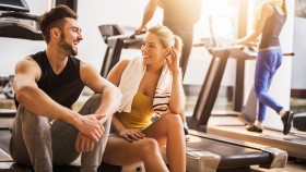 Man and woman flirting at gym thumbnail