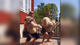 Don't Try This at Home: Swedish Couple Works Out with their Dogs thumbnail